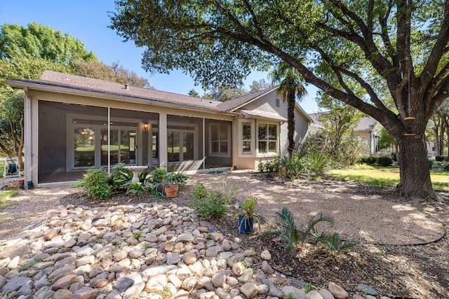 214 Lone Star Dr, Georgetown, TX 78633 - rear view of property featuring a sunroom