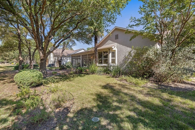 214 Lone Star Dr, Georgetown, TX 78633 - view of grassy yard featuring a sunroom