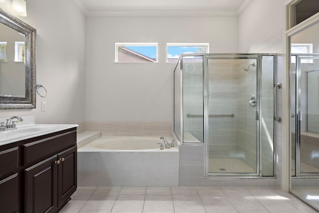 214 Lone Star Dr, Georgetown, TX 78633 - bathroom with vanity, a garden tub, tile patterned flooring, a shower stall, and crown molding