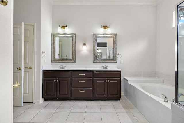 214 Lone Star Dr, Georgetown, TX 78633 - full bath with crown molding, double vanity, a garden tub, and tile patterned floors