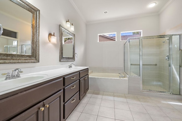 214 Lone Star Dr, Georgetown, TX 78633 - bathroom featuring ornamental molding, double vanity, a bath, a shower stall, and tile patterned flooring
