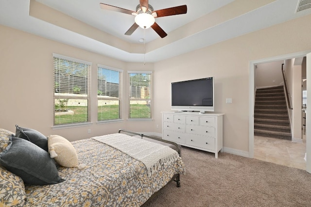 6321 Llano Stage Trl, Austin, TX 78738 - bedroom featuring carpet flooring, baseboards, a raised ceiling, ceiling fan, and a spacious closet