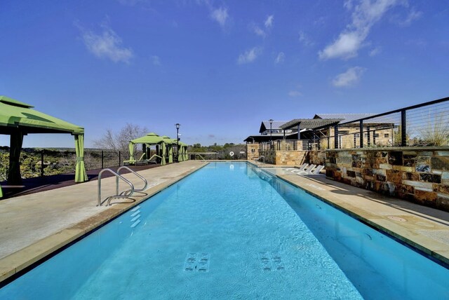 6321 Llano Stage Trl, Austin, TX 78738 - community pool with a gazebo and a patio area