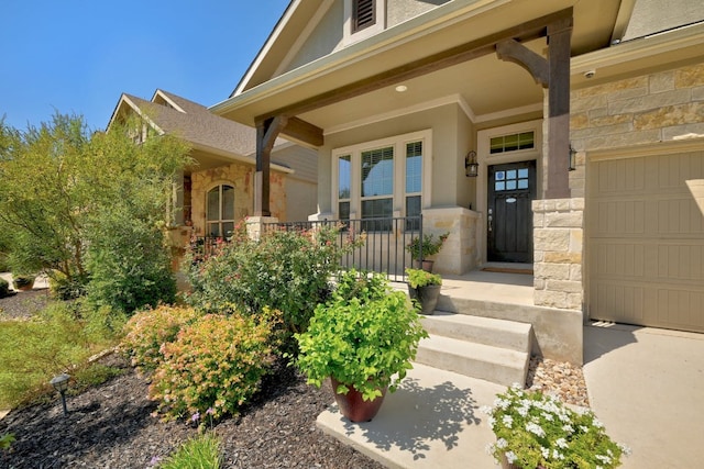 6321 Llano Stage Trl, Austin, TX 78738 - property entrance featuring stone siding, a garage, and covered porch