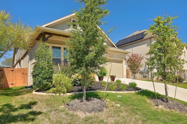 6321 Llano Stage Trl, Austin, TX 78738 - view of property hidden behind natural elements featuring an attached garage, driveway, and stucco siding