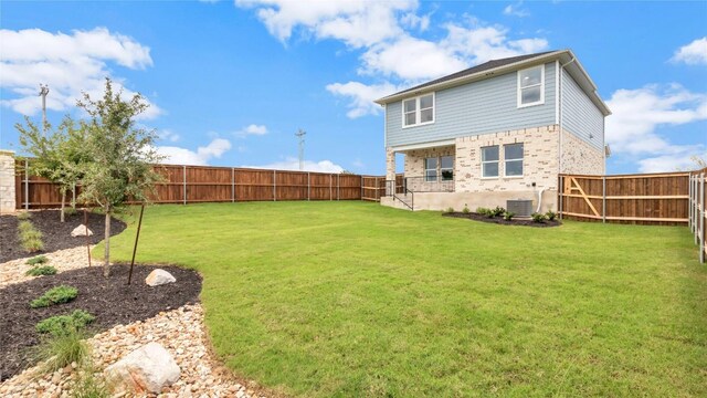 100 Heatherwood Ter, Marble Falls, TX 78654 - back of house with cooling unit and brick siding