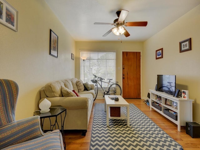 301 E 34th St Unit 107, Austin, TX 78705 - living area featuring a ceiling fan and wood finished floors