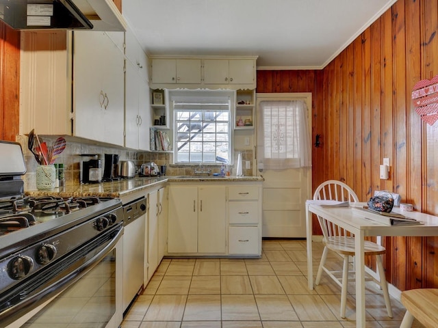 301 E 34th St Unit 107, Austin, TX 78705 - kitchen featuring stainless steel appliances, open shelves, under cabinet range hood, a sink, and tasteful backsplash