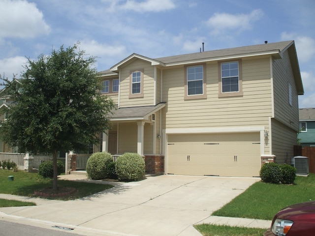 10506 Wylie Dr Unit 276, Austin, TX 78748 - view of front of property featuring central AC, concrete driveway, an attached garage, a porch, and fence