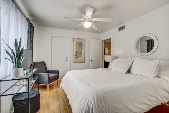 2200 Dickson Dr Unit 132, Austin, TX 78704 - bedroom featuring light wood-type flooring and a ceiling fan