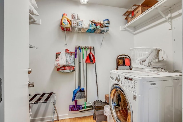 2200 Dickson Dr Unit 132, Austin, TX 78704 - laundry area featuring washer / clothes dryer and wood finished floors