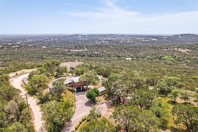 8016 Lupe Ln, Jonestown, TX 78645 - aerial view of property and surrounding area featuring a heavily wooded area