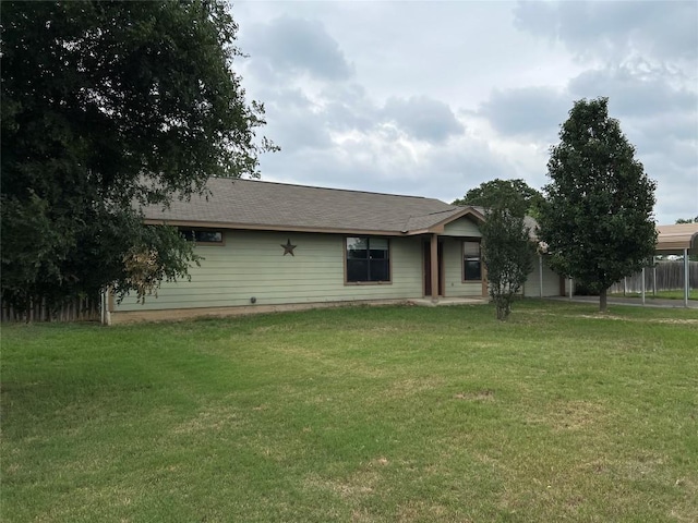 100 Acorn Trl, Cedar Creek, TX 78612 - back of property with a lawn