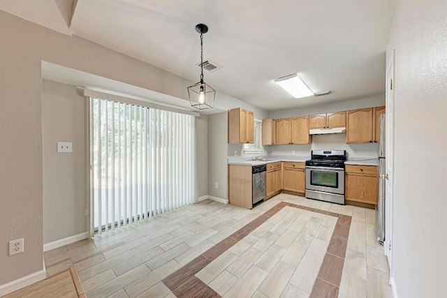 5006 Acorn Grove Ct, Austin, TX 78744 - kitchen featuring appliances with stainless steel finishes, under cabinet range hood, light wood-style floors, light countertops, and pendant lighting
