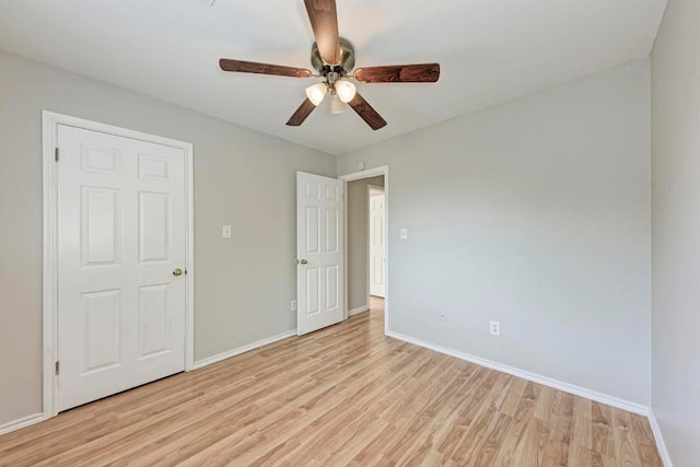 5006 Acorn Grove Ct, Austin, TX 78744 - unfurnished bedroom featuring light wood-style flooring and a ceiling fan