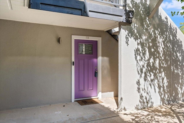 935 La Posada Dr Unit 158, Austin, TX 78752 - property entrance featuring stucco siding