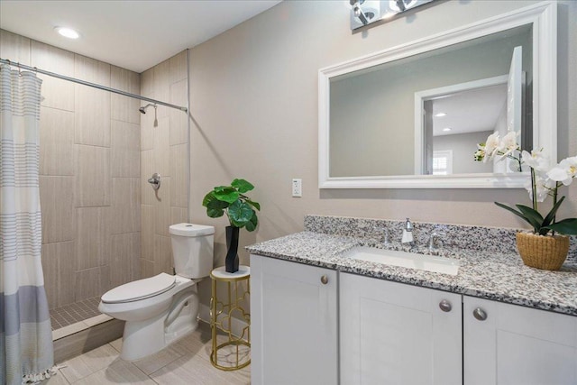 935 La Posada Dr Unit 158, Austin, TX 78752 - full bath featuring toilet, vanity, and a tile shower