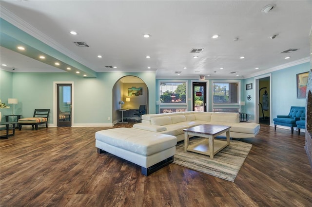 935 La Posada Dr Unit 158, Austin, TX 78752 - living room with crown molding, recessed lighting, wood finished floors, and arched walkways