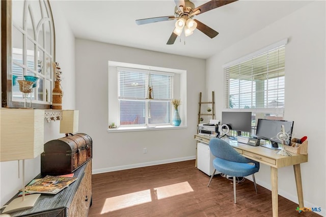 office area featuring wood finished floors, baseboards, and ceiling fan