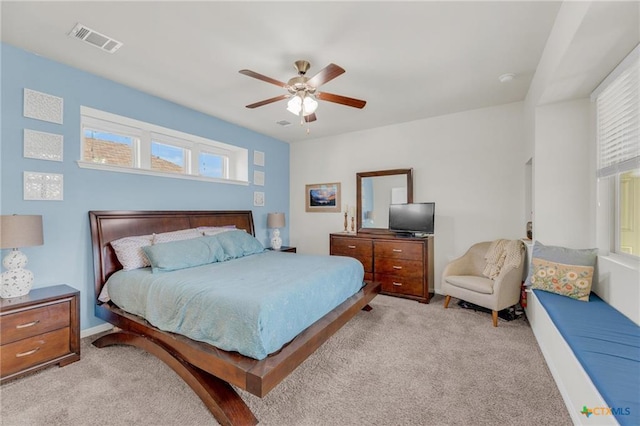 carpeted bedroom featuring a ceiling fan