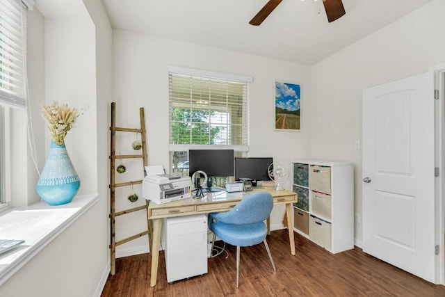 home office with wood finished floors, a ceiling fan, and baseboards