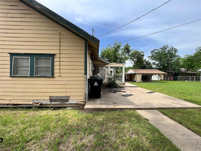 1118 N 2nd St, Temple, TX 76501 - view of side of property featuring a patio