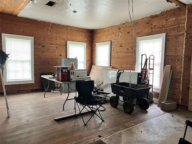 1118 N 2nd St, Temple, TX 76501 - misc room featuring hardwood / wood-style floors and wood walls