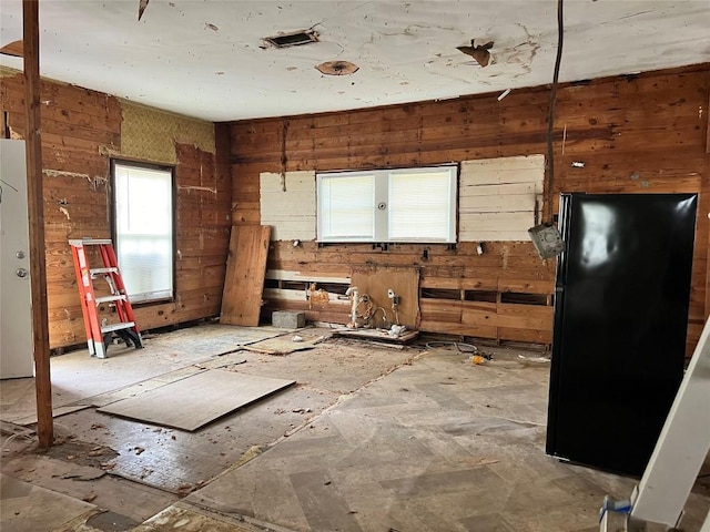 1118 N 2nd St, Temple, TX 76501 - kitchen featuring wooden walls