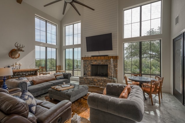 1433 Althaus Ranch Rd, Johnson City, TX 78636 - living area featuring high vaulted ceiling, a ceiling fan, and a fireplace