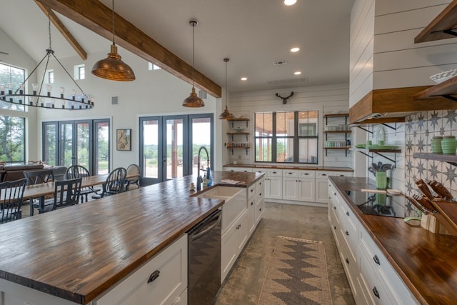 1433 Althaus Ranch Rd, Johnson City, TX 78636 - kitchen featuring butcher block countertops, open shelves, french doors, recessed lighting, and beam ceiling
