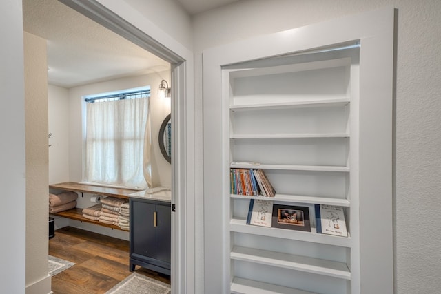 1433 Althaus Ranch Rd, Johnson City, TX 78636 - unfurnished room featuring dark wood-style flooring and built in shelves