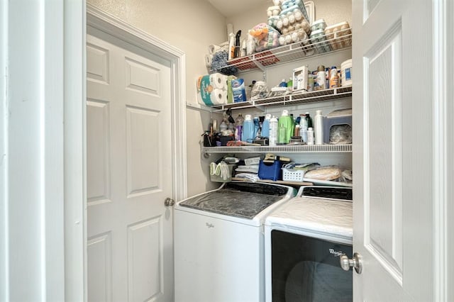 2409 Pecan St, Bastrop, TX 78602 - washroom with washing machine and clothes dryer