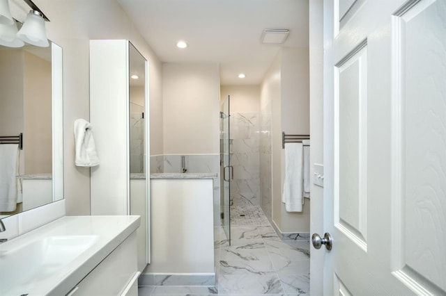 2409 Pecan St, Bastrop, TX 78602 - full bathroom featuring marble look tiles, a shower stall, recessed lighting, and vanity