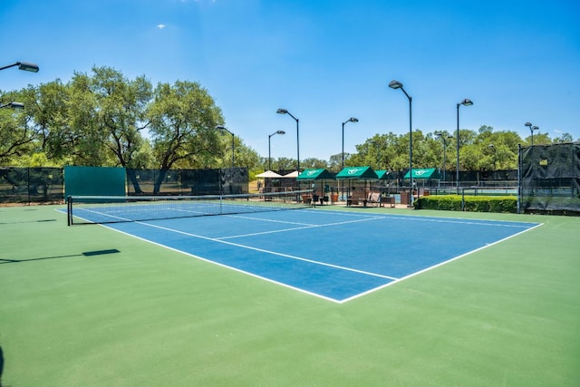 305 Indigo Ln, Georgetown, TX 78628 - view of tennis court featuring fence and community basketball court