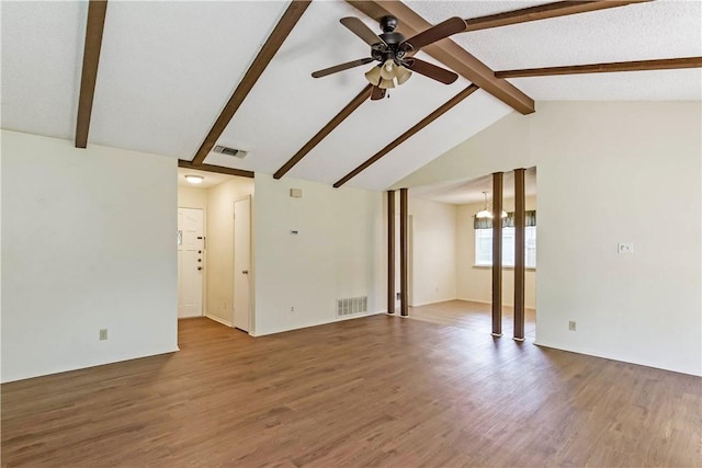 7309 Whispering Oaks Dr, Austin, TX 78745 - unfurnished living room featuring a ceiling fan and wood finished floors