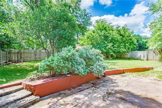 7309 Whispering Oaks Dr, Austin, TX 78745 - fenced backyard with a patio