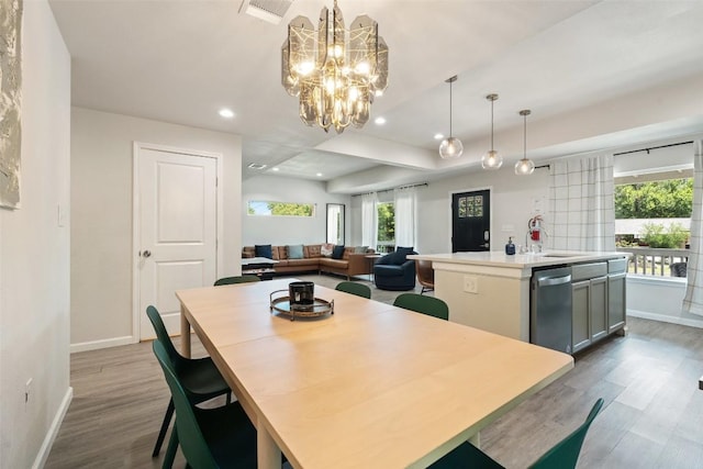 306 Juarez St, San Marcos, TX 78666 - dining room with baseboards, a chandelier, wood finished floors, and recessed lighting