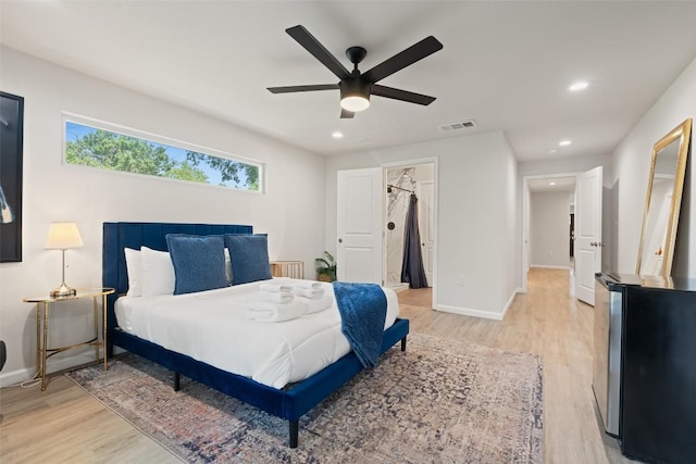 306 Juarez St, San Marcos, TX 78666 - bedroom with light wood-style flooring, baseboards, recessed lighting, and a ceiling fan
