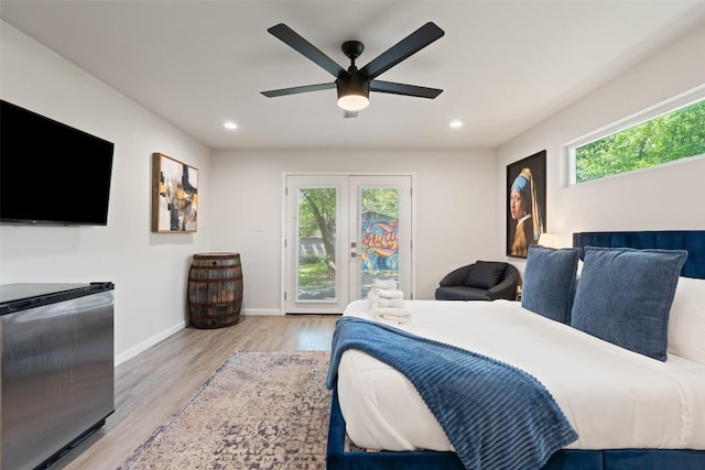 306 Juarez St, San Marcos, TX 78666 - bedroom featuring access to exterior, wood finished floors, recessed lighting, baseboards, and a ceiling fan