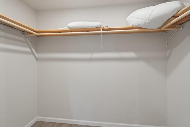 306 Juarez St, San Marcos, TX 78666 - walk in closet featuring light wood-style floors