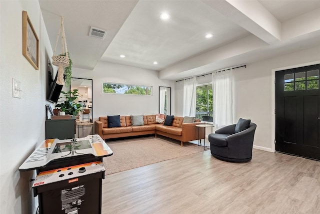 306 Juarez St, San Marcos, TX 78666 - living room featuring wood finished floors and recessed lighting