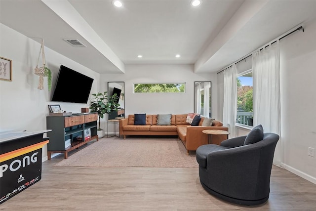 306 Juarez St, San Marcos, TX 78666 - living area featuring recessed lighting, light wood-style flooring, and baseboards