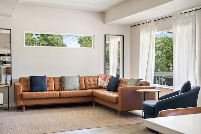 306 Juarez St, San Marcos, TX 78666 - living room with healthy amount of natural light and wood finished floors
