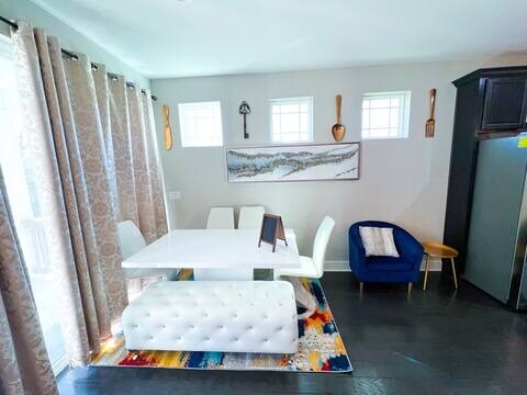 807 E 16th St Unit B, Austin, TX 78702 - dining room featuring healthy amount of natural light and wood finished floors