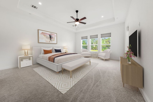 1928 Portobello Rd, Leander, TX 78641 - carpeted bedroom with a tray ceiling, recessed lighting, and a ceiling fan