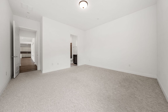 1928 Portobello Rd, Leander, TX 78641 - empty room featuring light carpet and baseboards