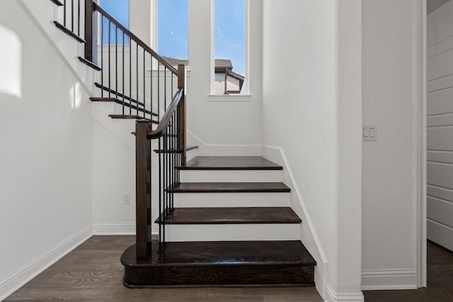 1928 Portobello Rd, Leander, TX 78641 - staircase with baseboards and wood finished floors