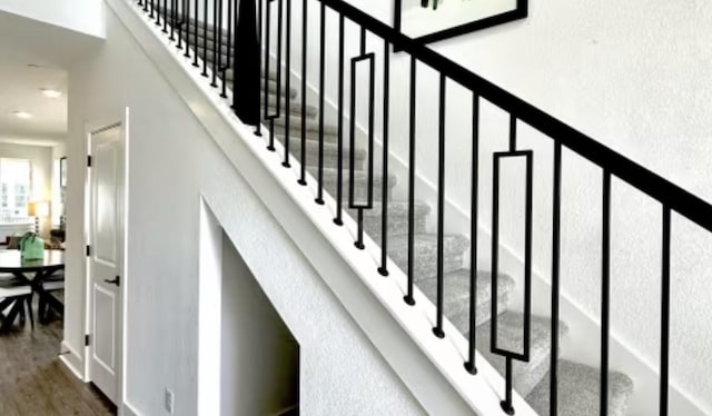 2593 Jack Nora Way, Round Rock, TX 78665 - stairway with wood finished floors and a towering ceiling