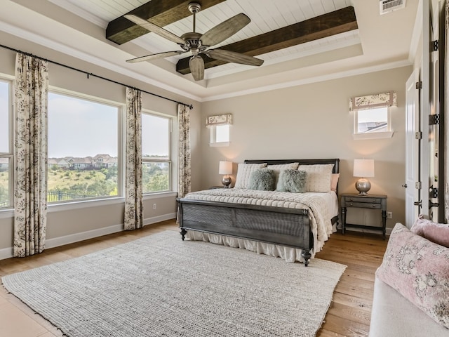 240 Townes Ct, Dripping Springs, TX 78620 - bedroom with wooden ceiling with exposed beams, wood finished floors, multiple windows, a raised ceiling, and crown molding
