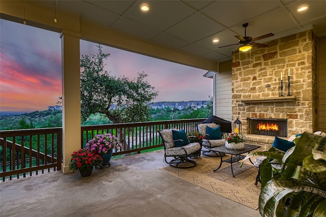 240 Townes Ct, Dripping Springs, TX 78620 - view of patio / terrace with ceiling fan and an outdoor living space with a fireplace